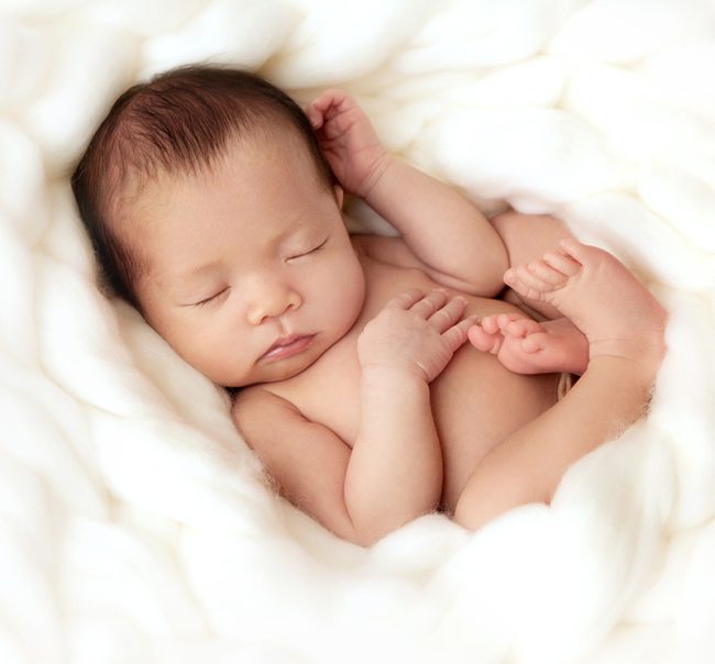 Baby photography London_Chelsea mob Sleeping baby nestled in soft blanket. resized for mobile