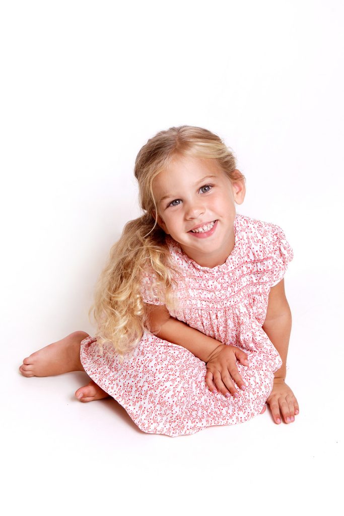 girl in a pink dress photographed for a modelling portfolio in London